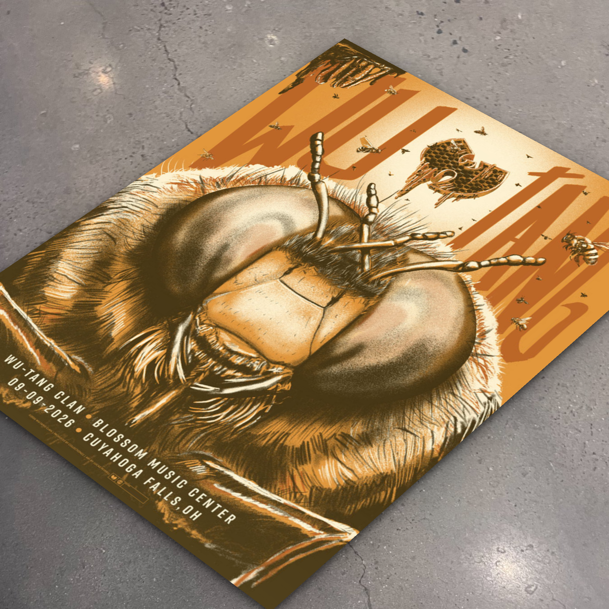 Wu-Tang Clan Cuyahoga Falls poster lying flat on the shop floor