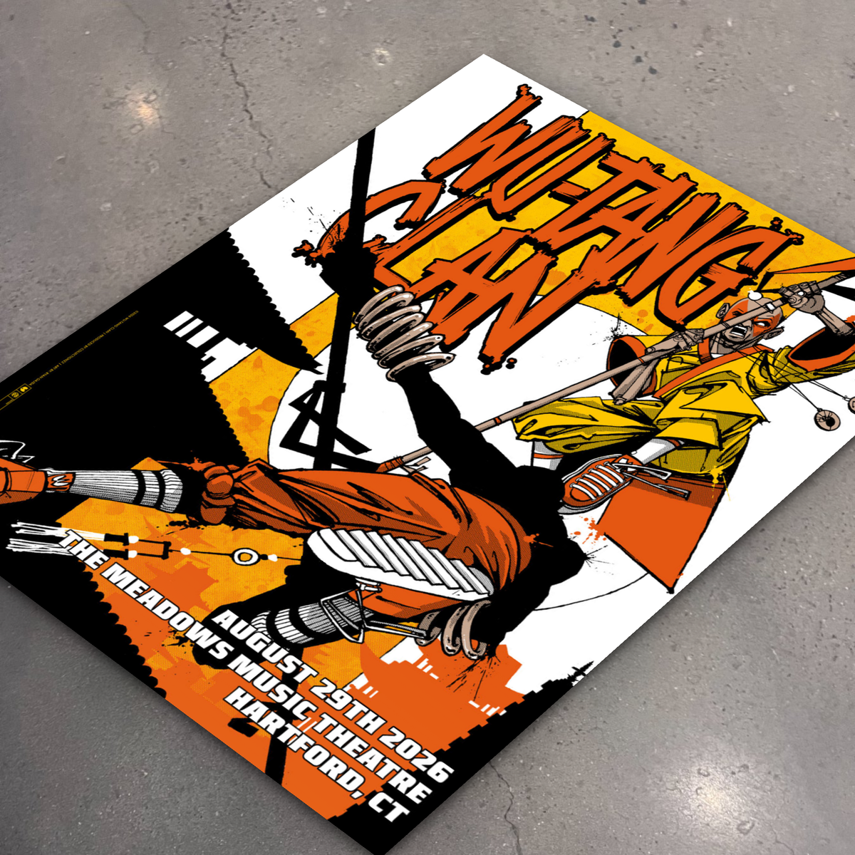 Wu-Tang Clan Hartford poster lying flat on the shop floor