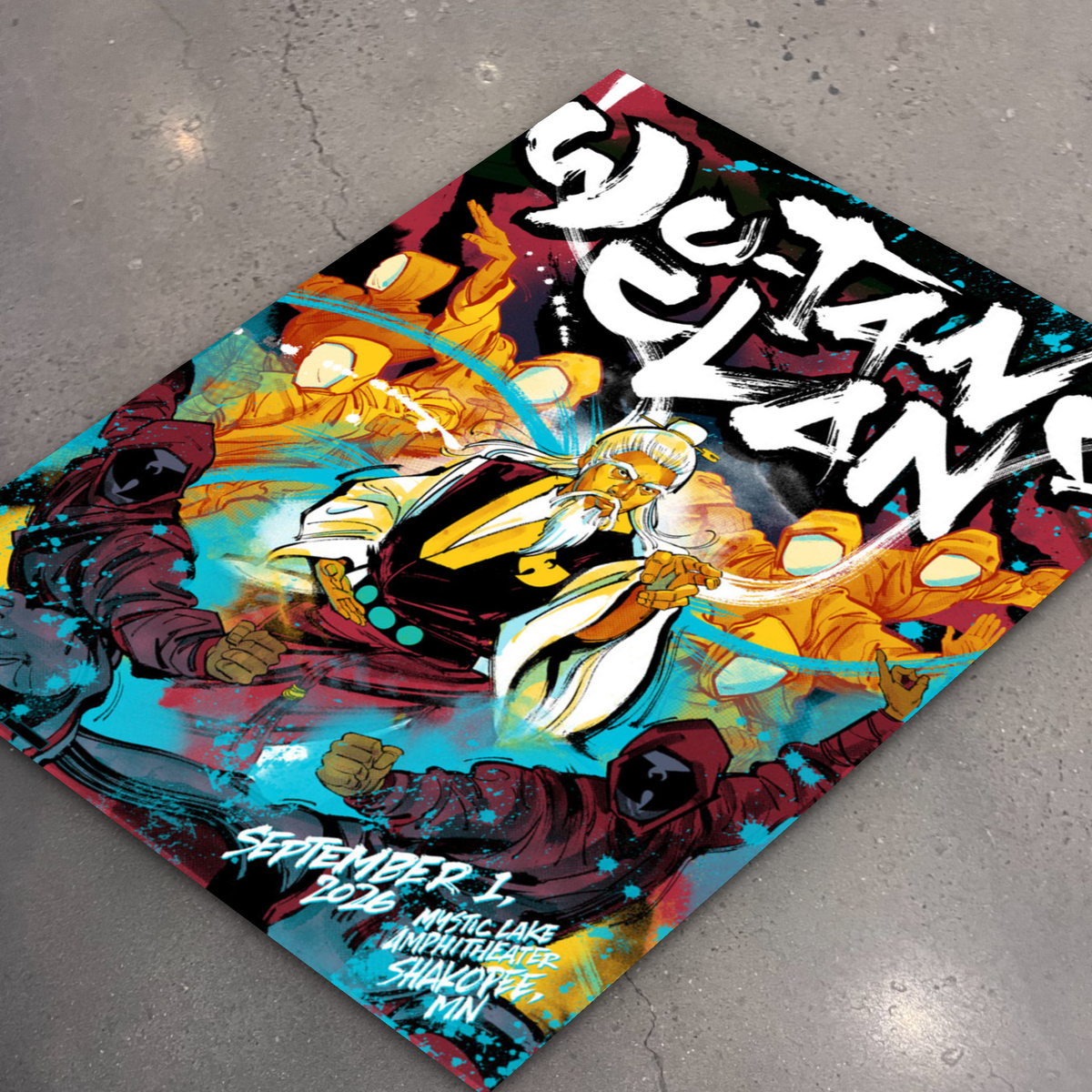 Wu-Tang Clan Shakopee poster lying flat on the shop floor